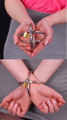 iluvbondage:  quad handcuff http://iluvbondage.tumblr.com