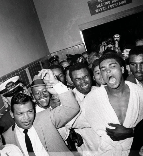 Muhammad Ali in the dressing room proclaiming he’s the greatest after defeating Sonny Liston alongsi
