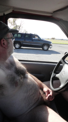 harrypman:  Beautiful day to drive out to the lake naked. The guy on the far side in the silver pickup ended up parking on my left. He got out and lifted the leg of his shorts to show me his dick. He played with mine, then he started to piss. He let me