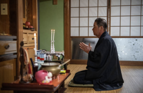 Masaichi Kawasaki, whose grandfather was converted to Catholicism by hidden Christians, prays at his