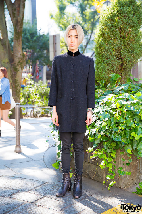 23-year-old Atsuki on the street in Harajuku wearing a jacket by the Japanese designer Hanae Mori wi