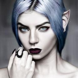 darquefool: Her eyes bored into you, relentless, the pale color contrasting with her deep dark lips. Elves were like this. Ancient creatures with eldritch motivations. You thought this one was different, because of the piercings, like a punk rock elf