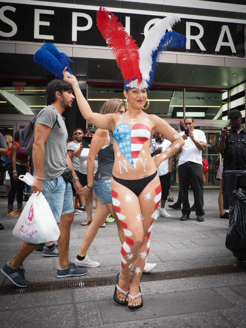 Sparky young denudas painted lady strikes a pose in Times Square. Pay a visit and support these ladi