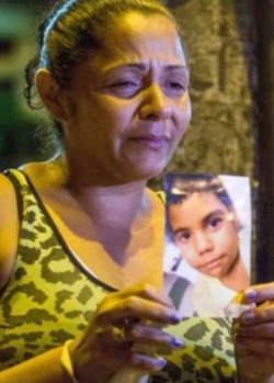 shamelesslyunladylike:shamelesslyunladylike:louislloyd:This is Eduardo de Jesus Ferreira. He’s a 10 year old kid who died yesterday, killed by the police who was in confrontation with criminals at a chanty town in Rio de Janeiro, Brazil. He was sitting