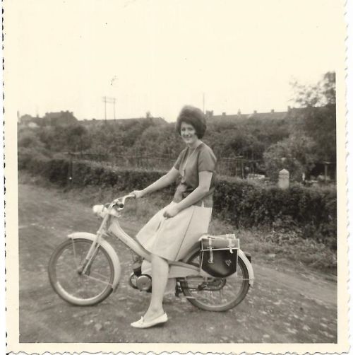 Woman on a Motobecane Mobylette - via ebay