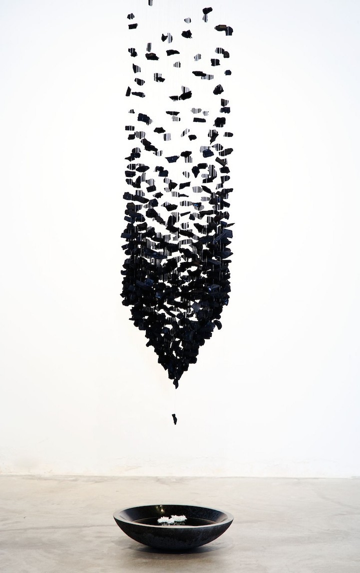 jedavu:  Columns of Suspended Charcoal Explore Relationship Between Nature and Man