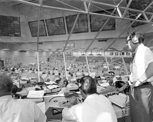 From the Kennedy Space Flight Center (KSC) control room, Apollo Program Director Lieutenant General 