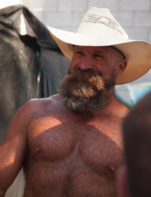 This cowboy is one stunningly handsome, hairy, sexy man and with an awesome beard - WOOF