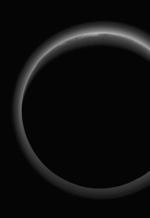 NASA&rsquo;s New Horizons spacecraft took this stunning image of Pluto. Sunlight filters through and