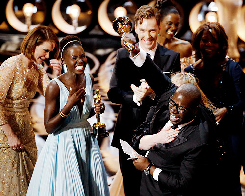 delevingned-deactivated20151023:  The cast and crew of ‘12 Years a Slave’ celebrate after winning the Best Picture award onstage during the 86th Annual Academy Awards 