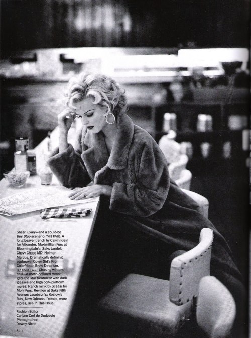 Eva Herzigova, as Marilyn Monroe, reading at counter. Star Quality by Dewey Nicks. US Vogue, Oc