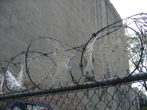 bombing:  Crystal Gregory - Invasive Doilies, 2011Crocheted doilies on razor wire fences in New York