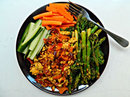 Brunch: curried tofu scramble, grilled asparagus and purple sprouting broccoli with lemon and chilli