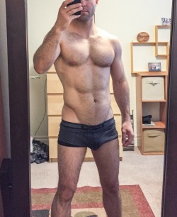 texasfratboy:  damn, that’s one hot and hairy daddy! love his underwear bulge! 