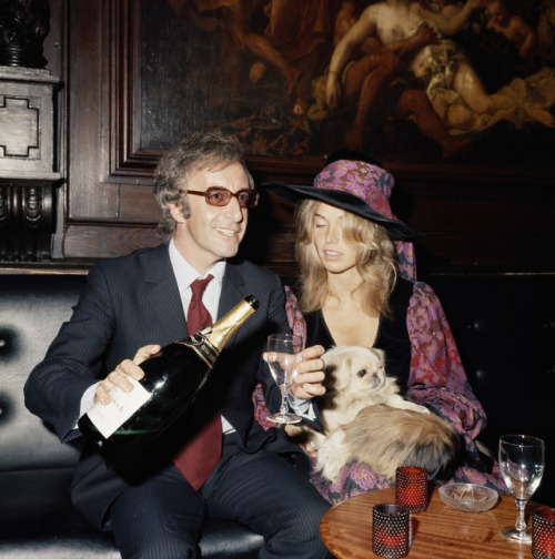 richardhenrysellers: Peter Sellers pouring a glass of champagne as he sits beside his wife, Australi