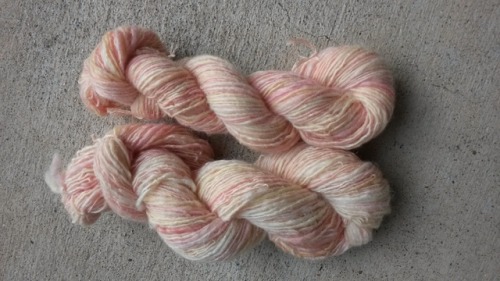 Left is Chintz by SpinJones fiber, spun thick and thin. Right is Rainbow Sherbert by To-Ply Fiber Ar