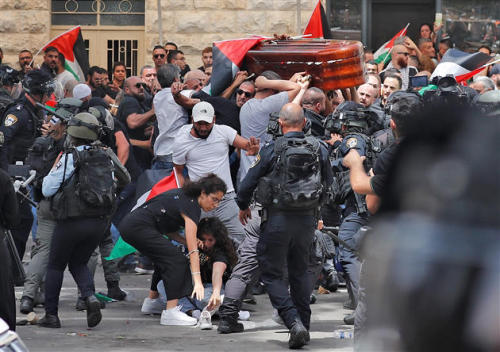 Israeli forces beating carriers of Shireen