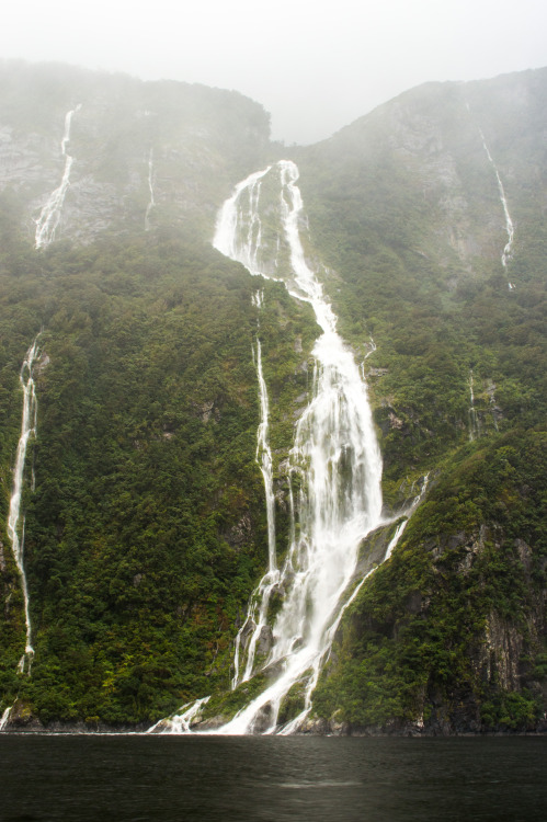 Waterfall at Milford Sound.Milford Sound, Fiordland, South Island, New Zealand