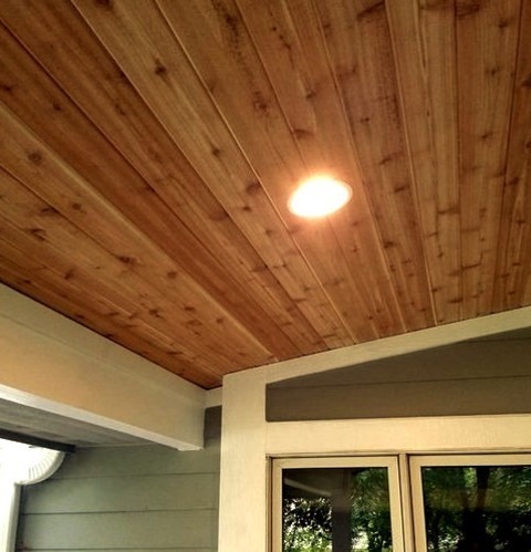 A Sizable Deck In The Backyard With An Addition To The Roof