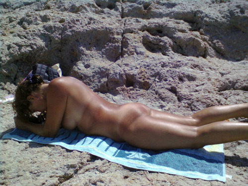 My wife!Lovely photos of a lovely sunbathing lady. But seriously I’m worried about her burning