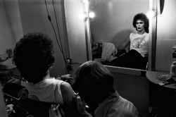 therealmickrock:  Tim Curry getting his Boss tattoo on the set of the Rocky Horror Picture Show, 1974 