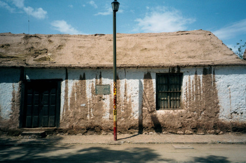 Effects of Rainfall, San Pedro de Atacama, Chile, 2000.2001: The brown streaks down the whitewashed 