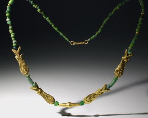 archaicwonder:Roman Glass and Gold Fish Bead Necklace, 2nd-5th Century ADA restrung necklace of Roma