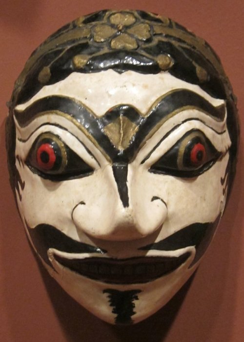 Indonesian mask of polychromed wood.  Artist unknown; 18th-20th century.  Now in the Honol