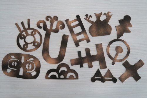 Wooden Prehistoric Inspired Symbols for the participatory theatre piece, ‘Scar of the Sabretooth’ Ba