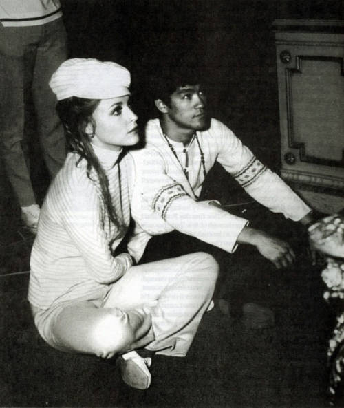 giablo69:  Bruce Lee working with Sharon Tate on the set of the Dean Martin’s Matt Helm film “The Wrecking Crew”, 1969. 