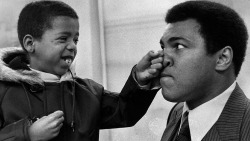 imransuleiman:   Mustafa Abdullah, 7, proves you can catch the champ, Muhammad Ali, with his guard down. 