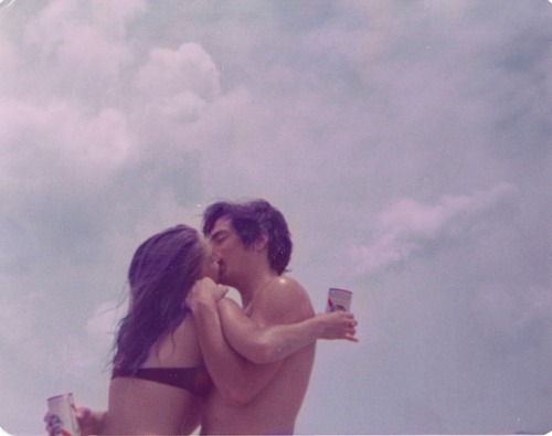 wild-nirvana:My parents in love on the beach in the 70’s