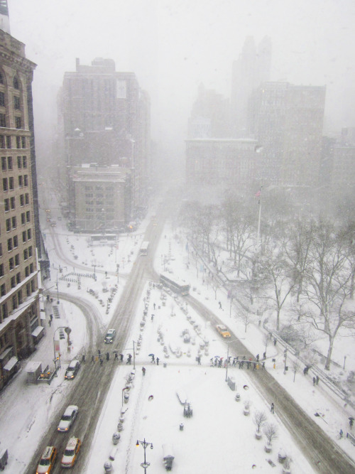 firstsecondbooks:  It’s like a ghost town inside the Flatiron today! View of the Empire State Building from our office. No really. We swear. The Empire State Building is in this picture. 