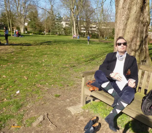 Preppy Men Style In Versailles, Wearing Navyblue Sebago Classic Loafers, Long Burlington Argyle Socks,