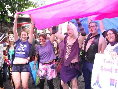 j-applebee:  London LGBT Pride 2014 was the biggest one ever! There was a huge visible bi presence, with over sixty in the bisexual marching group. The wet weather didn’t dampen our spirits too much, and even the biphobic remarks shouted by fellow marcher