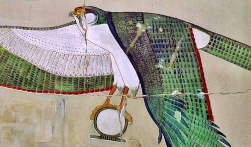 totenbuch: The God Horus in His form of sacred falcon spreading His wings in protection and holding 
