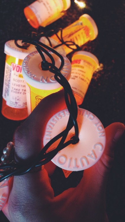 transitory296-50:Re-fashioning my empty prescription bottles into pretty mood lighting. 