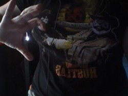 capnsuicidesammy:  Crappy Web cam pics… But one of my all time favorite shirts…  I think I know this chic lmao