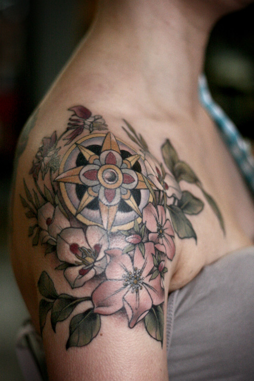 kirstenmakestattoos:  Pretty compass rose shouldercap for Kirsten (who has been making my hair look fabulous for years, even the awkward growing-out phase) with a floral wreath. Sego lily, columbine, wild rose.  