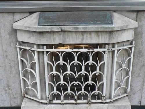 The Stone of BruteinOn a busy street in the middle of the City of London, hiding behind a metal gril