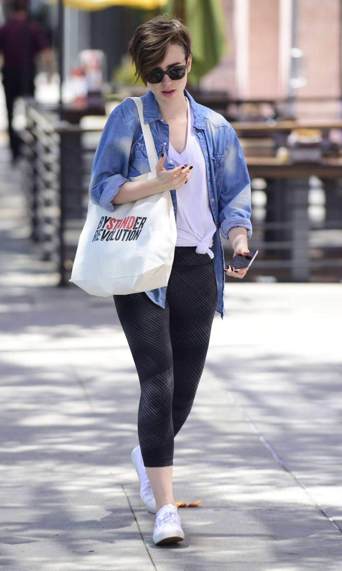 lilycollinsnews: Lily Collins - Leaves Body Pilates in West Hollywood 04/29/2015