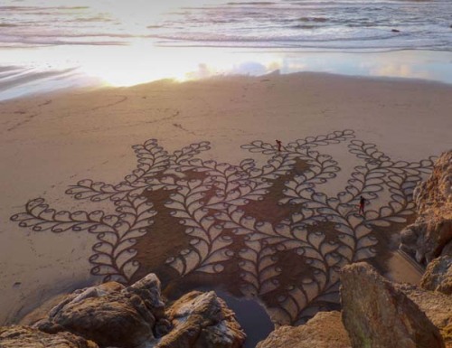 A Man Takes A Single Rake To The Beach. And When You Zoom Out And See It… Mind BLOWN.