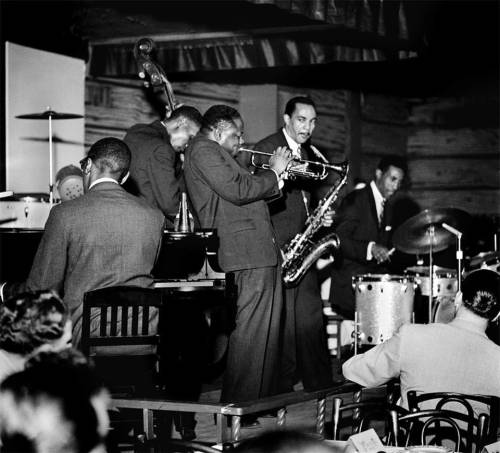 Richie Powell, George Morrow, Clifford Brown, Harold Land, and Max Roach in NYC, 1954. Photo by Herm