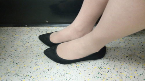A more pointed toe on a black faux suede ballet flat
