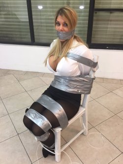 skirtnapper:A Hot babe in a skirt and a roll of duct tape….. it doesn’t get any better than that!