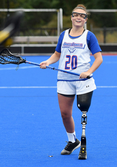 Noelle Lambert left leg above knee amputee LaCrosse player.