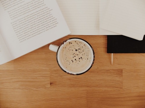 delphicoracle:spending my day with my nose in a book, a cup of coffee by my side.