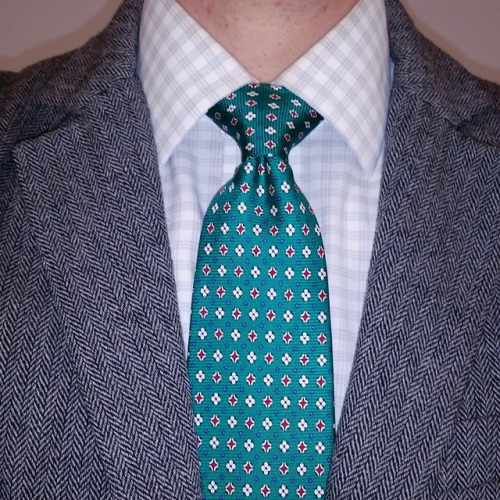 I normally pair patterned shirts with a tie that has an even bigger pattern.  But today, I went