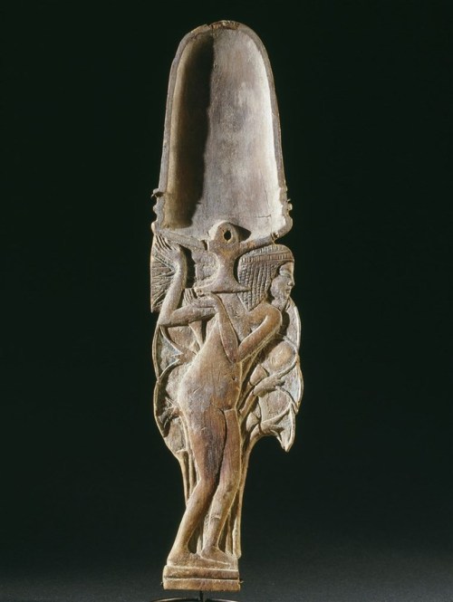 Cosmetic spoonThis cosmetic carved in the form of a young woman in a papyrus thicket supporting a ve