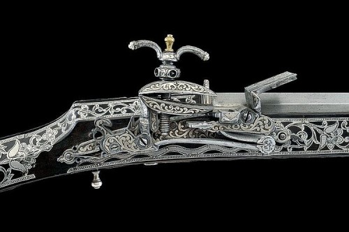 A beautiful silver mounted miquelet musket crafted by a gunmaker named &ldquo;Kahli&rdquo; f